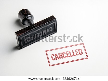 Rubber stamping that says 'Cancelled'. Royalty-Free Stock Photo #423626716