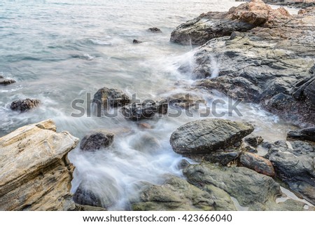 Long exposure shot. Sea scape with stone beach at Thailand, Motion blur, slow shutter speed