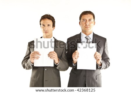 Business couple holding blank signs