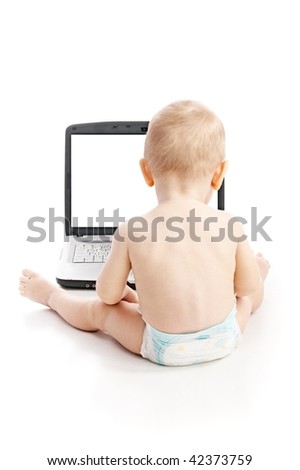 Infant using laptop over white