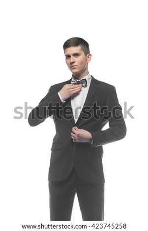 Portrait of a young elegant handsome business man isolated on white background