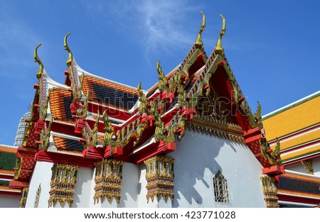 Thai buddhism church against blue sky background at Wat Pho, Bangkok, Thailand