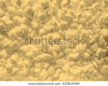 White polystyrene beads texture useful as a background vintage sepia