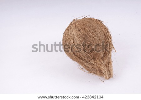 Coconuts on a white background. DOF and copy space