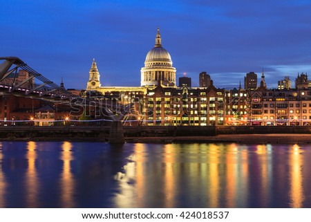 Millennium Bridge leading to Saint Paul's Cathedral during sunset in central London, UK