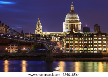 Millennium Bridge leading to Saint Paul's Cathedral during sunset in central London, UK
