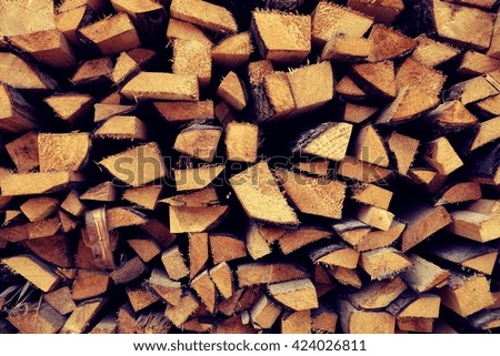 Chopped firewood. Wood logs texture background