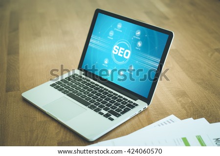 SEO chart with keywords and icons on screen