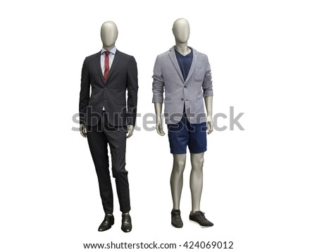 Two male mannequins dressed in suit Isolated on white background. No brand names or copyright objects. Royalty-Free Stock Photo #424069012