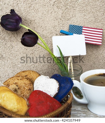 American (USA) flag, black tulips, patriotic cookies, coffee. concept for information holidays, dates, invitations. SOFT focus image