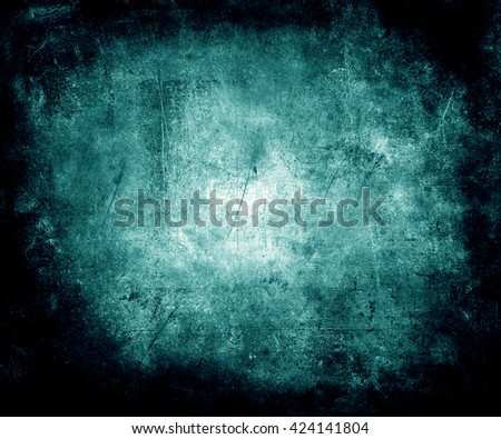 Beautiful blue abstract vintage grunge background with faded central area for your text or picture, scratched scary background with frame