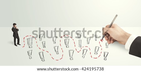 pensive businessman in front of hand drawn labyrinth