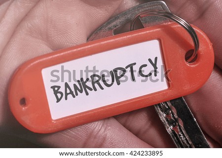 BANKRUPTCY word written on key chain