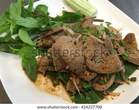 pork liver meat and variety of tropical herbs hot spicy chilli mixed salad for serve with rice as tradition north eastern THAILAND style menu call sweet liver: TABWHAN