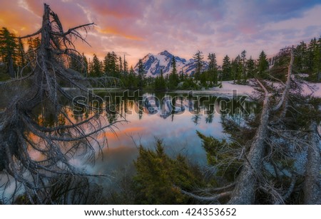 scene of mt. Shucksan with reflection on the lake when sunrise,Washington,usa.