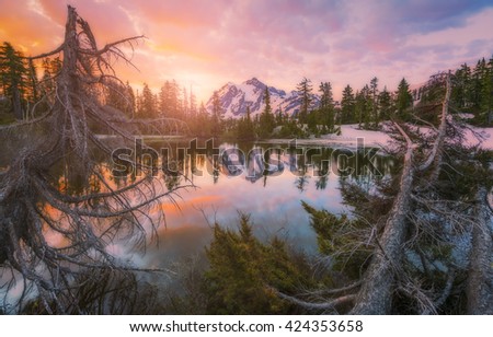 scene of mt. Shucksan with reflection on the lake when sunrise,Washington,usa.