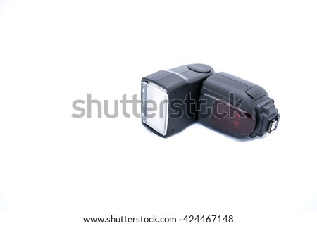 Modern camera flash isolated on white - copy space