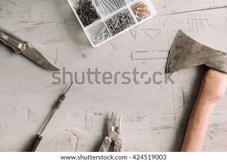 Set of tools on the grey wooden table