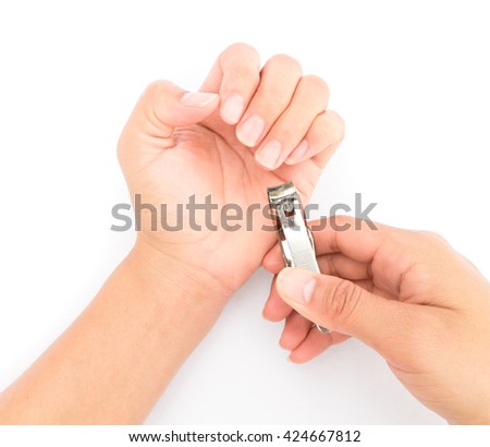 Closeup women cut fingernails on white background