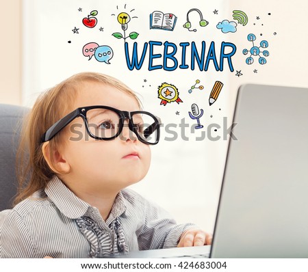Webinar concept with toddler girl using her laptop