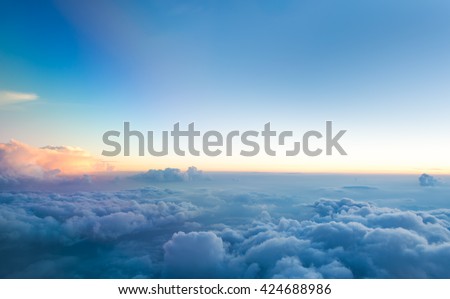 View from airplane window to see sky on evening time. Royalty-Free Stock Photo #424688986