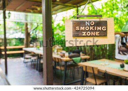 no smoking metal sign in the meeting zone