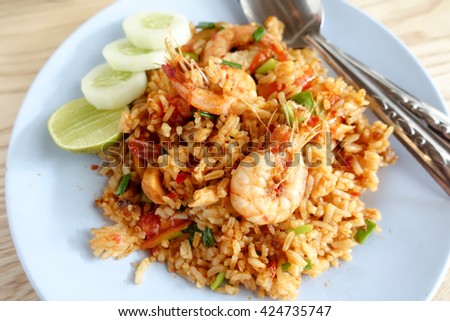 Thai fried rice with spicy Tom Yum Goong (Prawns) sauce, (Selective Focus) Royalty-Free Stock Photo #424735747