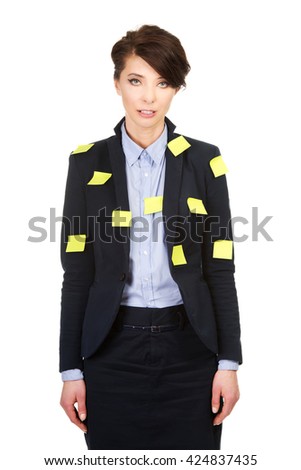 Businesswoman with adhesive cards.