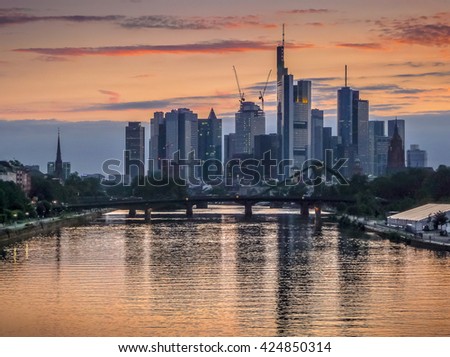 Beautiful view of Frankfurt am Main skyline in golden evening light at dusk, Germany