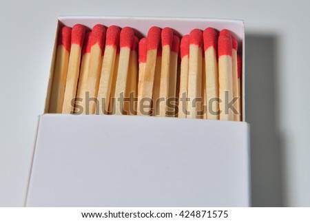 Empty paper matchbox with wooden matches on it. Matchbook case photo image ready for write your text