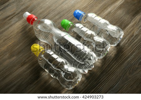 Bottled water on the wooden table,close up