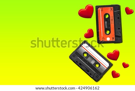 Old audio cassette. Multicolored audio tapes. Close-up view. The concept of old music. The era of retro songs. Isolated objects. The music of yesteryear.