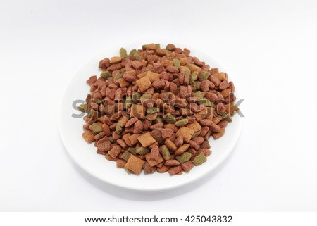 Dry food for cats or dogs isolated on white background