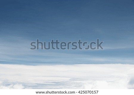 White cloud and blue sky and  land, take a picture on the airplane.