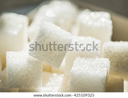 Close up shot of white refinery sugar. Royalty-Free Stock Photo #425109325