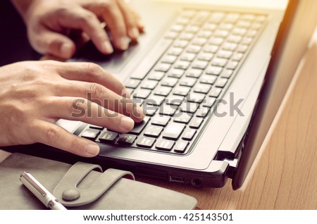 Closeup hand are using laptops