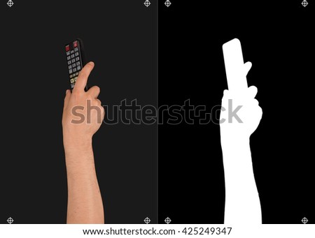 Hand on a black background and a mask for cutting