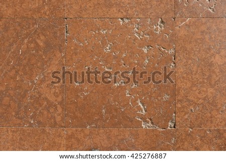 Natural marble stones in old castle hall. Filling with cement into nice natural texture background