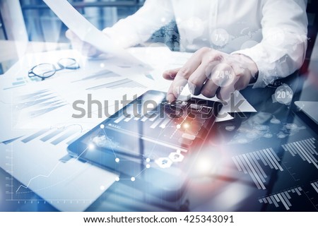 Risk Management Work process.Picture Trader working Market Report Document Touching Screen Tablet.Using Worldwide Graphic Icons,Stock Exchange Report.Business Project Startup.Horizontal,Flares Effect Royalty-Free Stock Photo #425343091