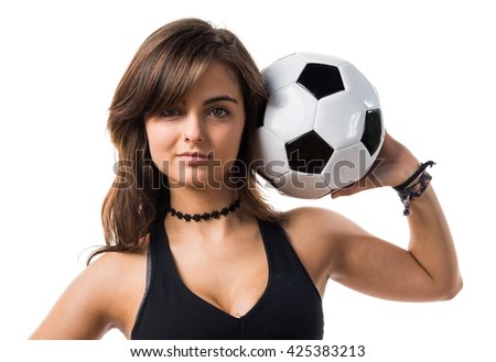 Woman holding a soccer ball