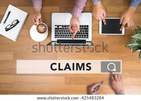 CLAIMS CONCEPT man touch bar search and Two Businessman working at office desk and using a digital touch screen tablet and use computer objects on the right, top view