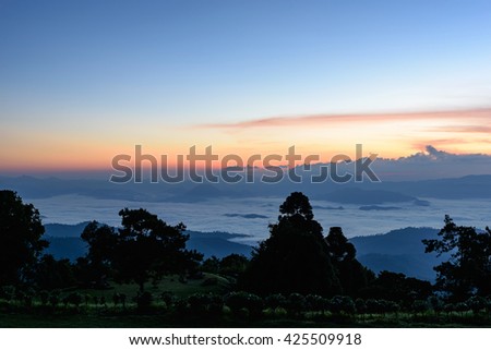 View of mist on the mountain at sunset over mountain range, mountain gap, mountain layer at Huai Nam Dang National Park, chiang Mai, Thailand