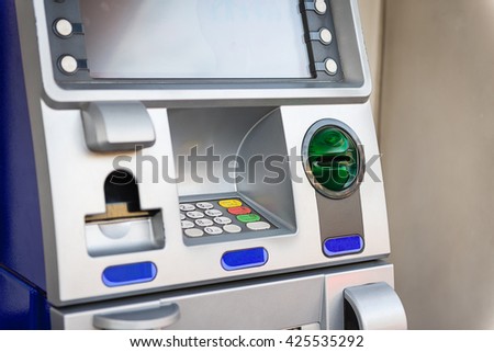 Blue ATM machine