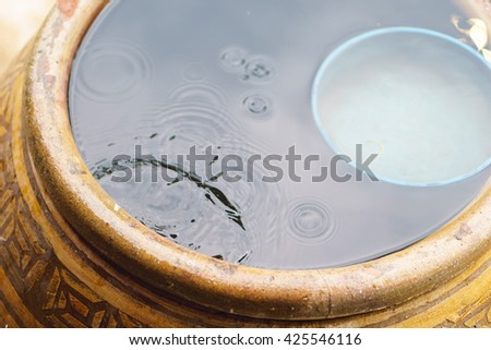 Thai traditional jar with rain water