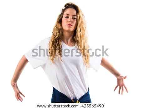 Teenager pretty blonde girl dancing
