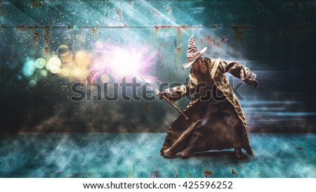 Toy a magician casting a spell. It's a toy. It is not a person.. Royalty-Free Stock Photo #425596252
