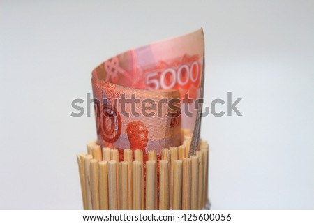 parcel of banknotes of the Russian rubles in a bamboo mat