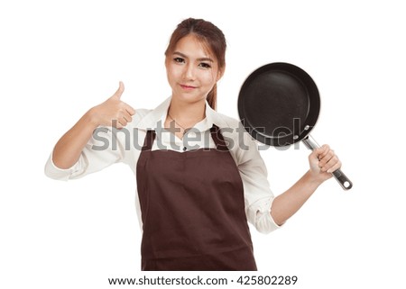 Asian girl cooking  thumbs up  with frying pan  isolated on white background