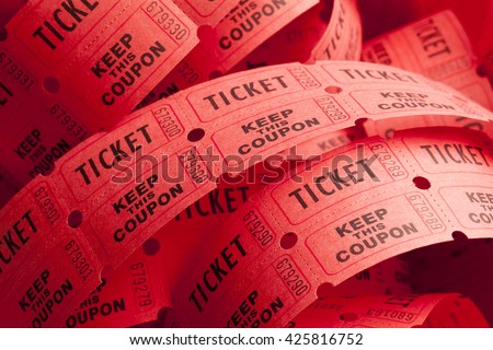 Unwound Messy Roll of Red Tickets Piled Up. Royalty-Free Stock Photo #425816752