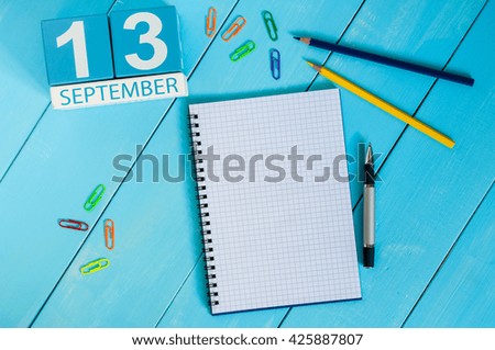 September 13th. Image of september 13 wooden color calendar on white background. Autumn day. Empty space for text